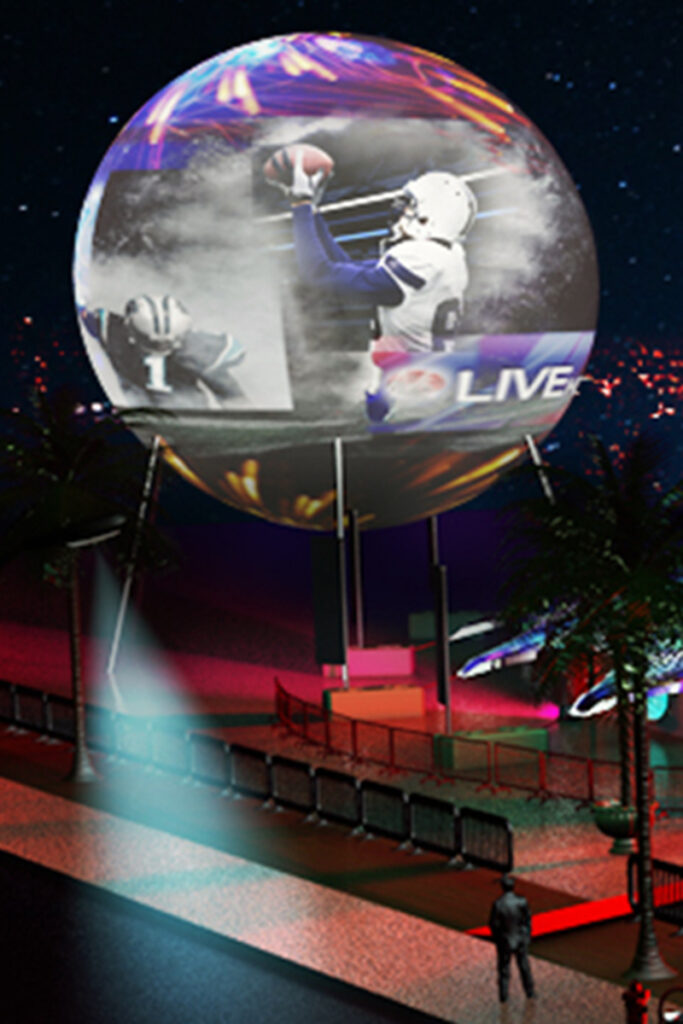 Large outdoor projection sphere 83 feet tall displaying football goalkeeper making save with LIVE branding at outdoor stadium venue with elevated positioning for FIFA World Cup and major football championship activations