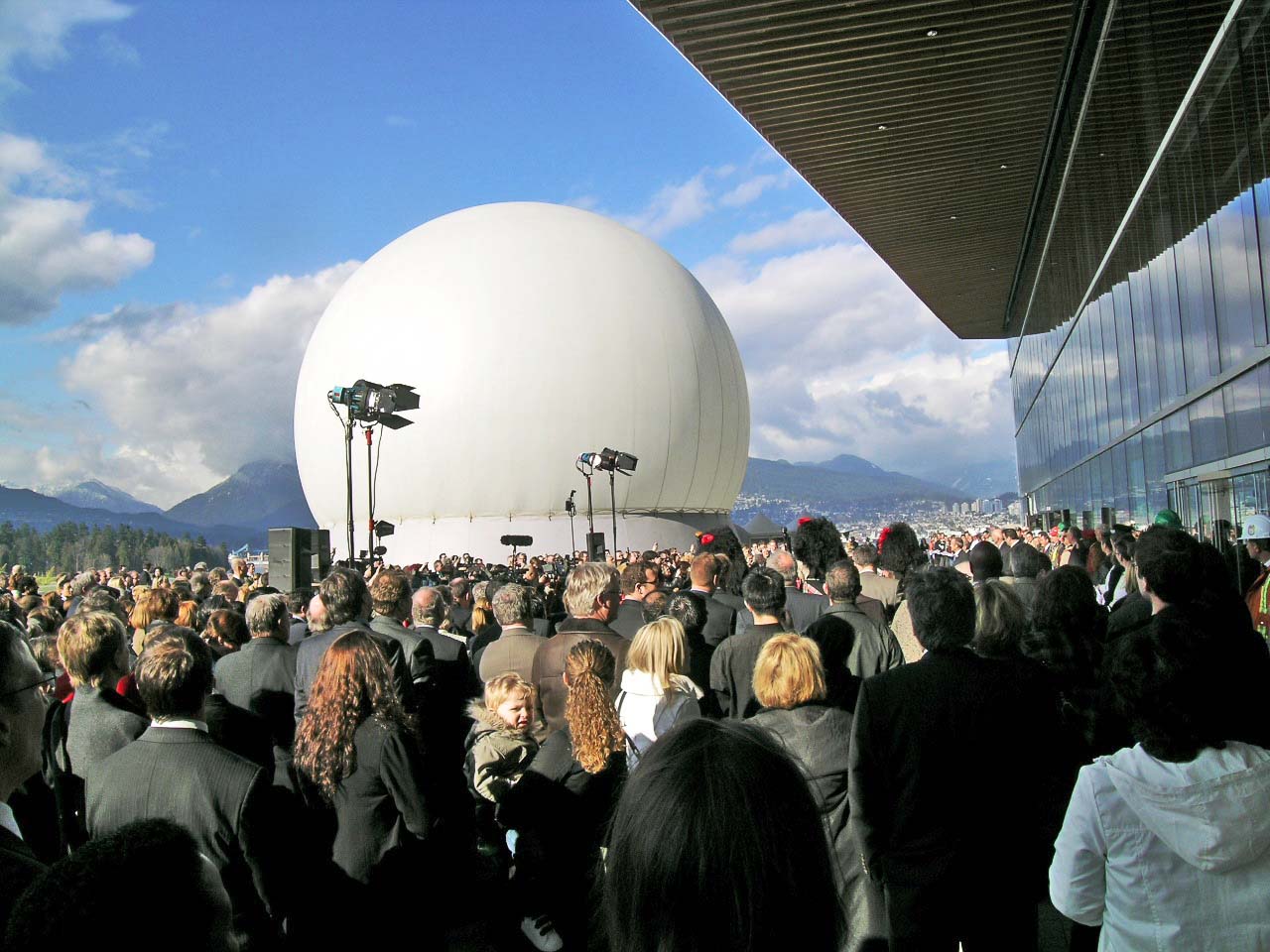 Absolute Hollywood inflatable projection dome exterior at Vancouver Convention Center with large crowd gathered outside