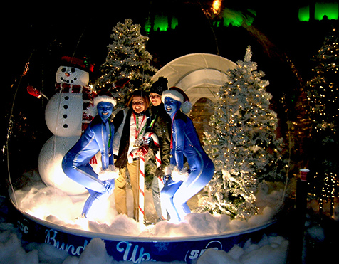Life size snow globe with children and families inside at SBC corporate holiday event