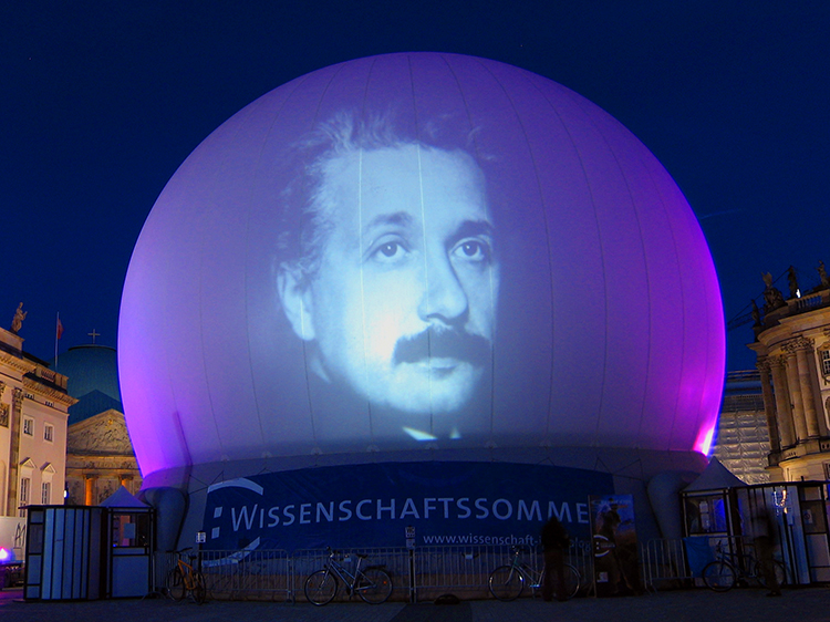 Absolute Hollywood projection domes — StratoSphere 60-foot inflatable sphere Berlin Einstein portrait exterior projection