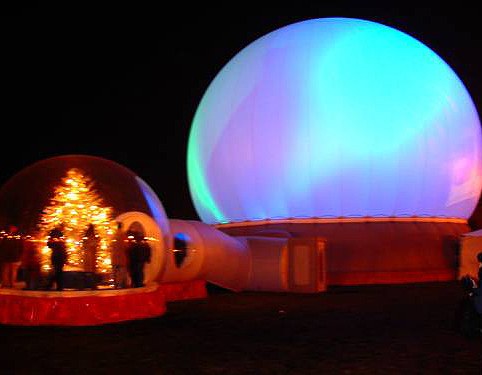 Walk in snow globe joined by a lit Airlock tunnel to the StratoSphere Projection Dome, Sears winter festival, Chicago, 2002 — Absolute Hollywood