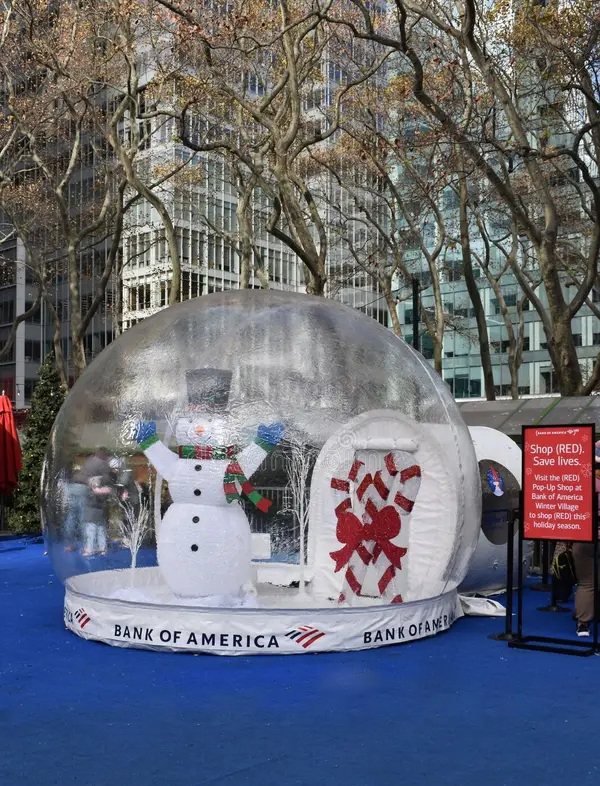 Pro-Series Airlock Tunnel Entry snow globe at Bank of America Bryant Park Winter Village — premium ADA model