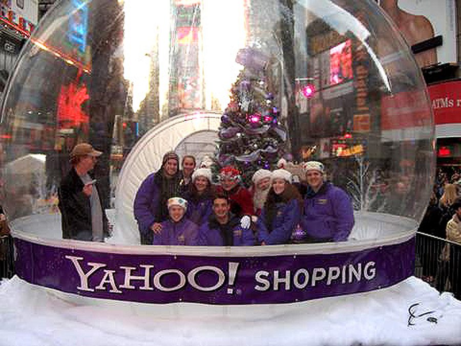 Walk in snow globe with guests at Yahoo! Shopping, Times Square, New York — Absolute Hollywood giant inflatable globe at night