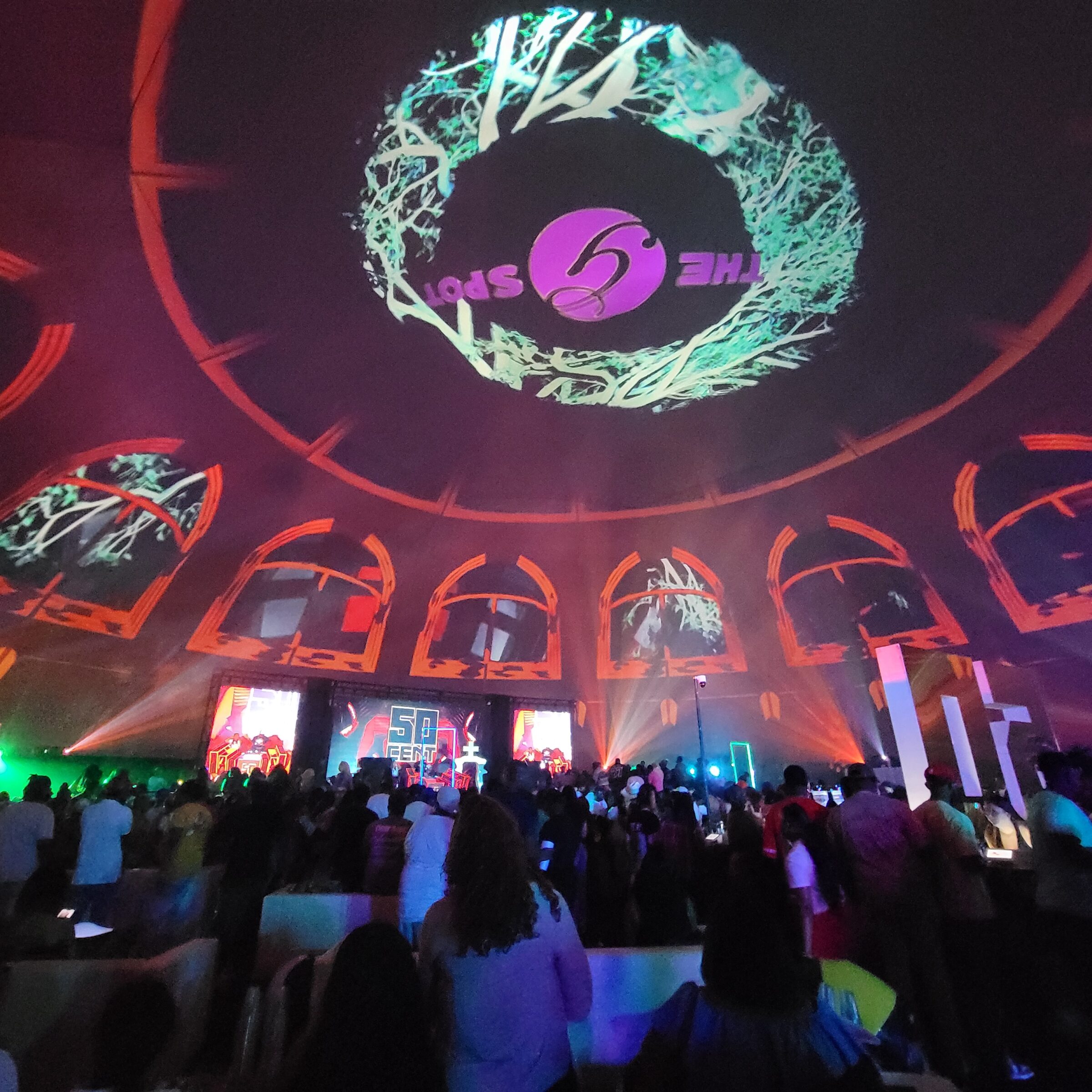 Concert crowd inside a 160 ft projection dome rental under full 360-degree projection at the Humor and Harmony festival in Shreveport.